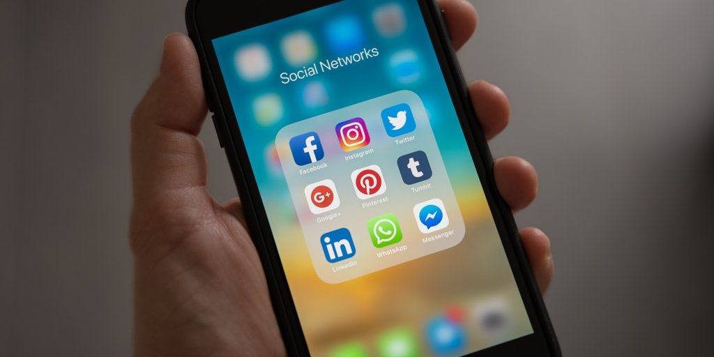 smartphone with social media icons